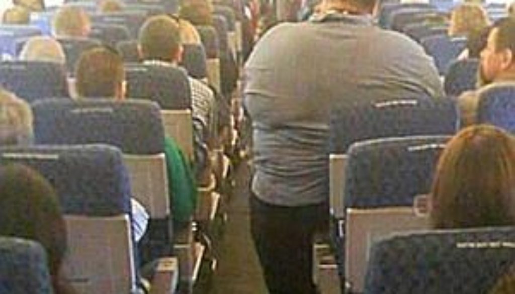 Fat-Guy-on-Plane-1024x585.jpg