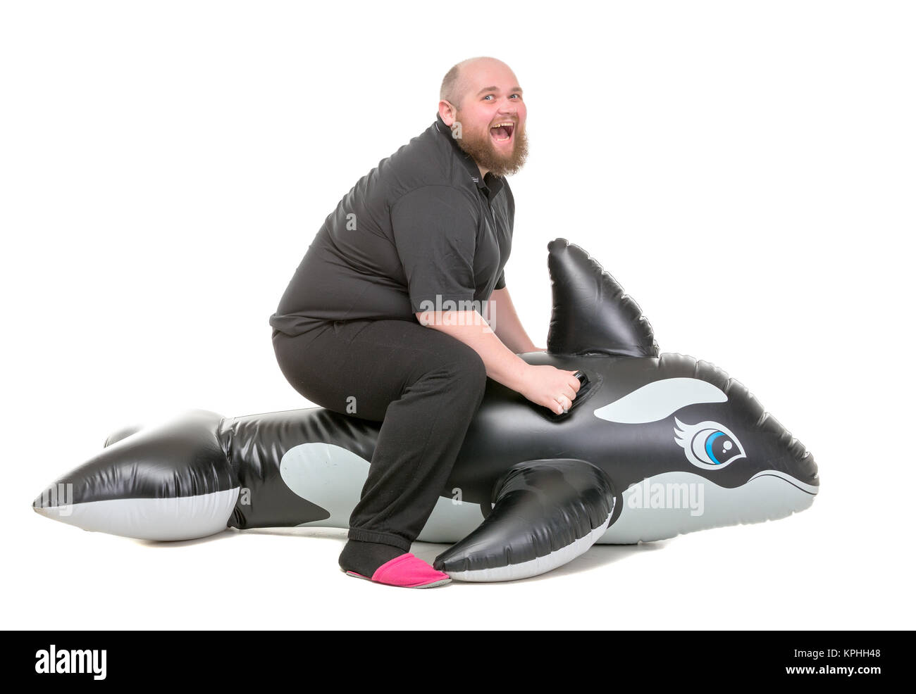 fat-man-fun-jumping-on-an-inflatable-dolphin-KPHH48.jpg